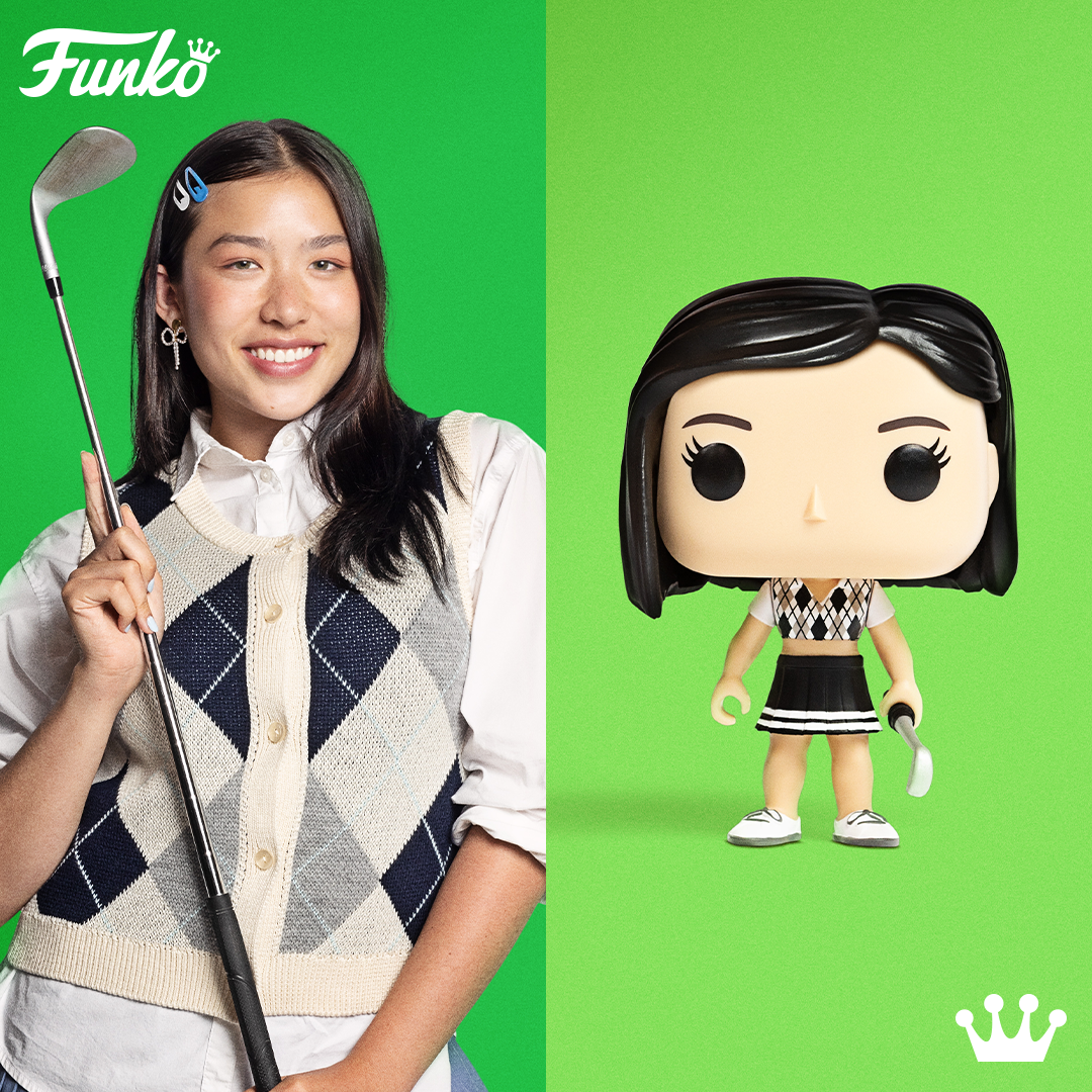 A young golfer stands next to her Pop! Yourself custom collectible, both wearing matching black skirts and argyle pattern sweaters.